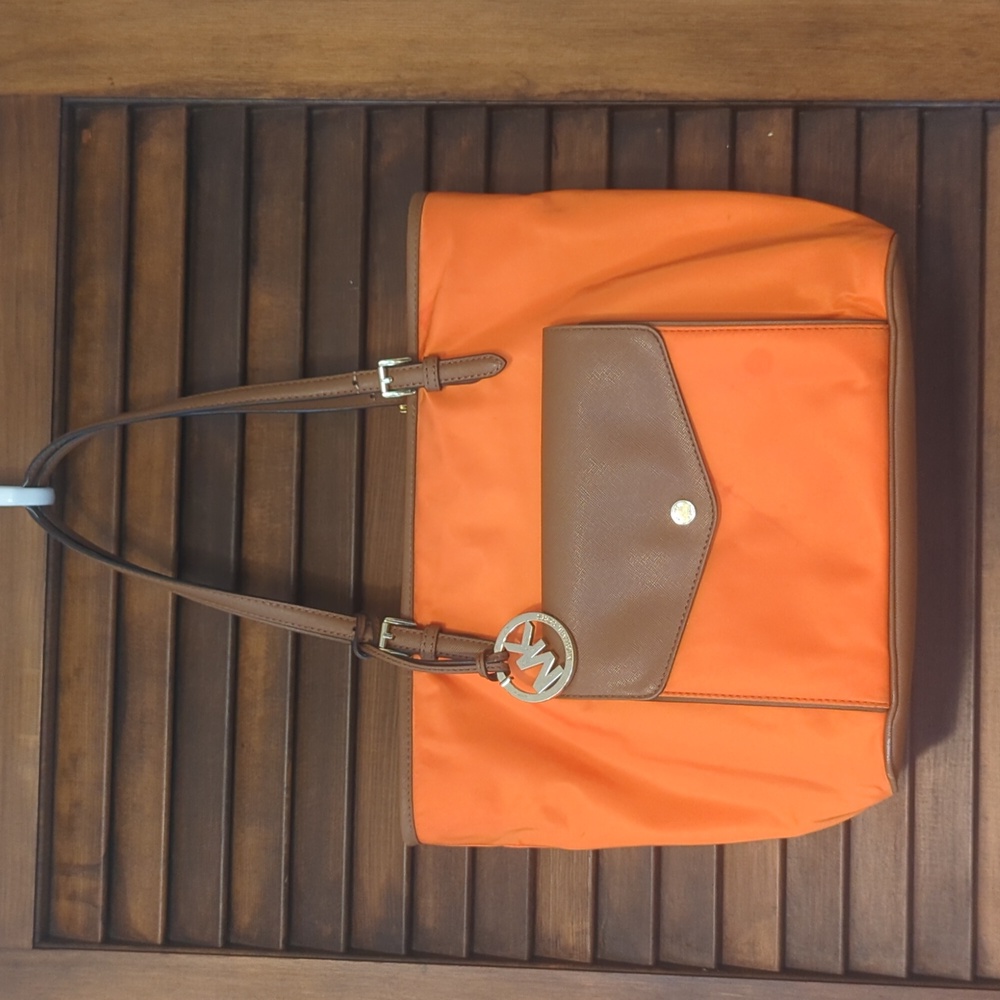 Michael kors orange and tan purse